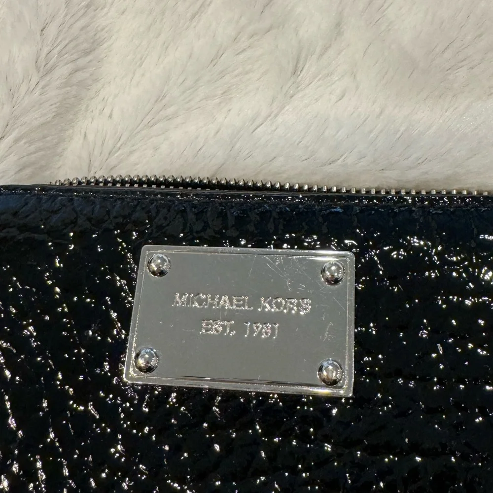 Michael Kors Snakeskin Wristlet in amazing condition!‎